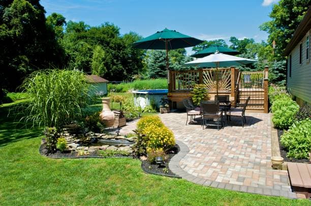 Beautifully designed patio featuring expertly installed pavers for a relaxing outdoor retreat Beautifully designed patio featuring expertly installed pavers for a relaxing outdoor retreat