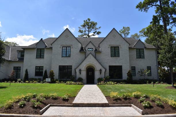 Newly installed walkway leading to the entrance of a luxury home Newly installed walkway leading to the entrance of a luxury home