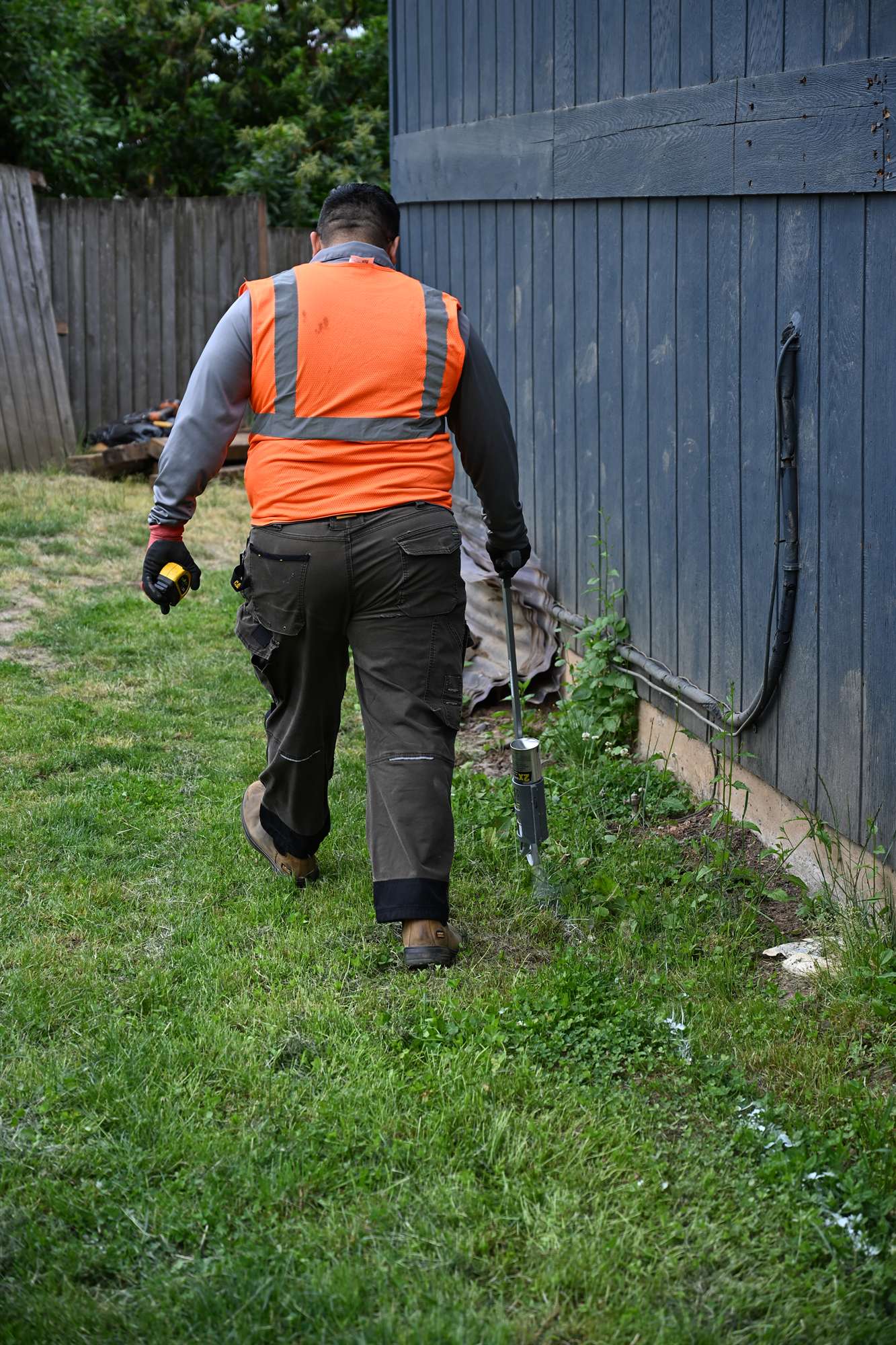 OCL crew member working zone by zone during a residential irrigation system installation