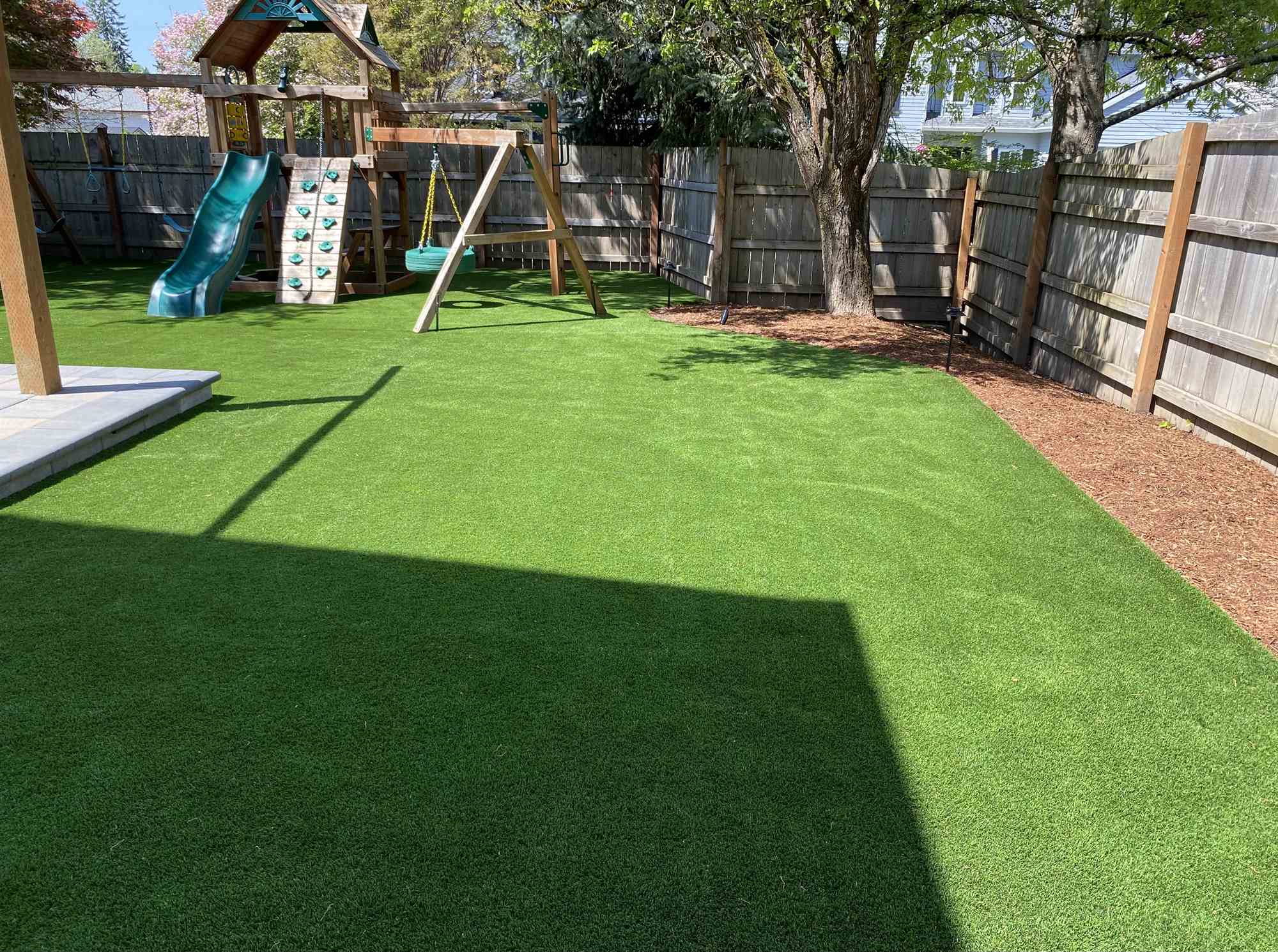 Established back lawn and play area after a new lawn installation