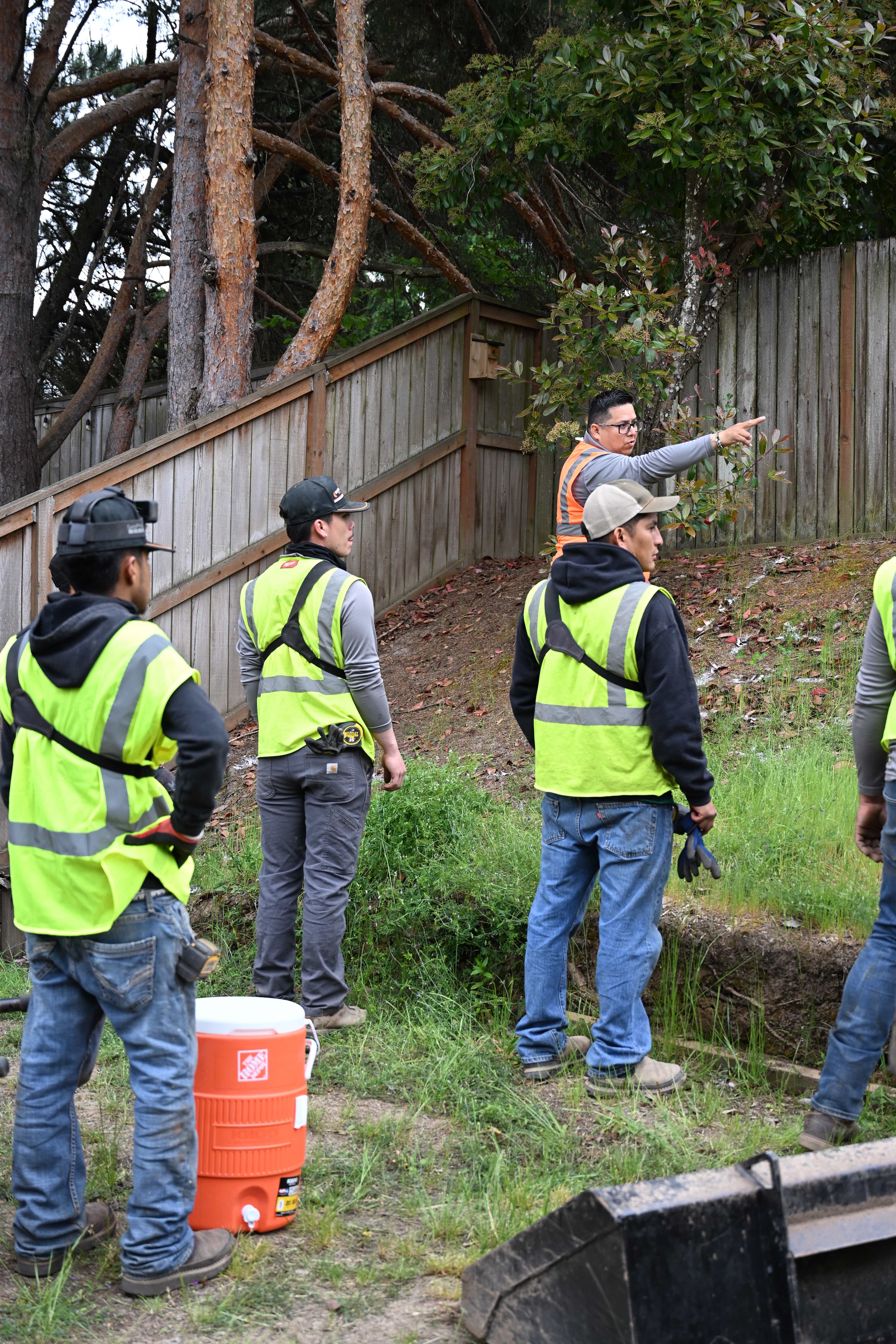 OCL Landscaping foreman directing the crew at a job site