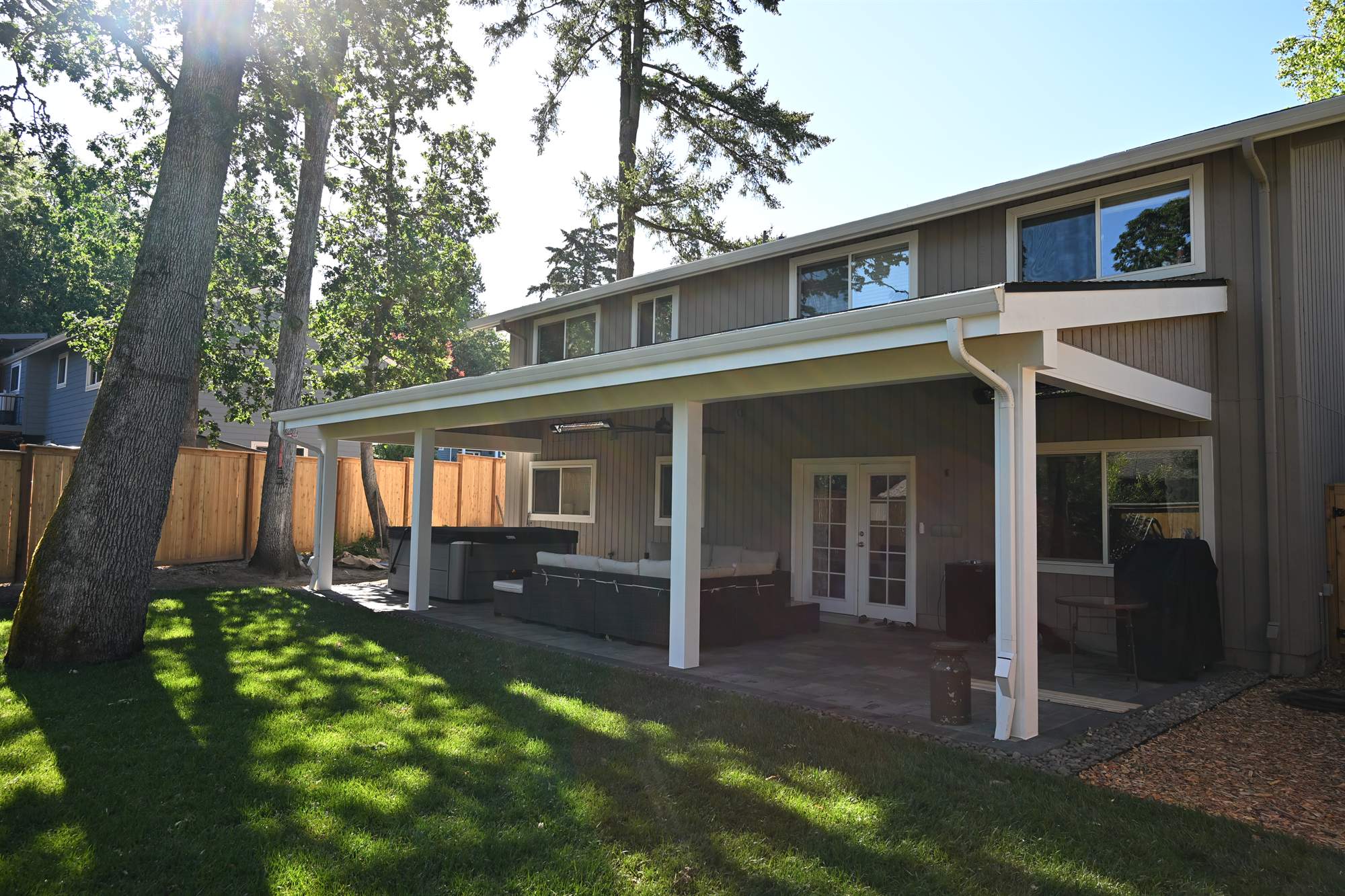 Finished covered patio and lawn at the final project walkthrough