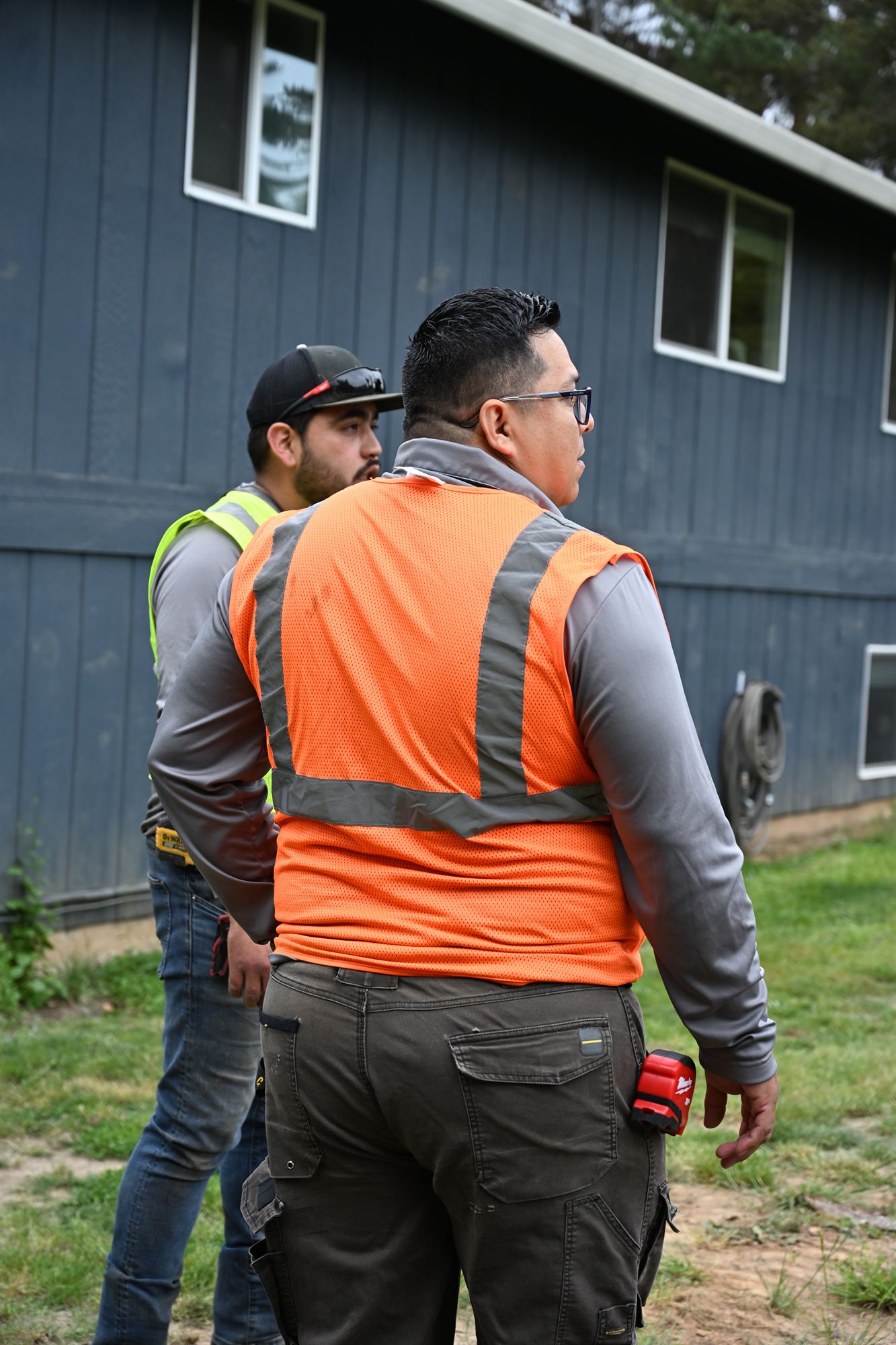 OCL crew members reviewing the plan together during a site visit
